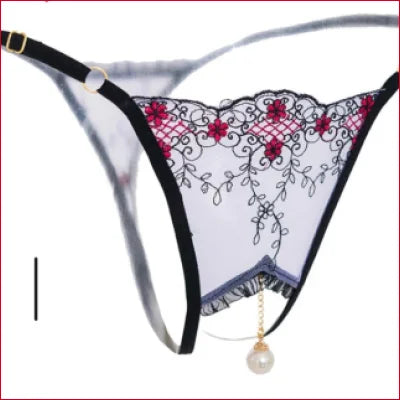 Decorative tantalizing open thong with black trim and red floral embroidery