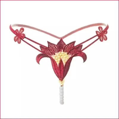 Red floral-shaped thong featuring decorative elements from Intimate Faux Pearl collection