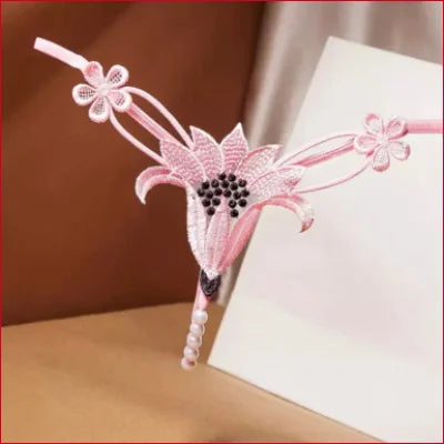 Delicate pink floral bookmark with beaded accents for Intimate Faux Pearl lingerie