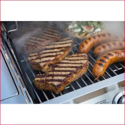 Grilled steaks and sausages on a Performance Series Silver Propane Gas Grill