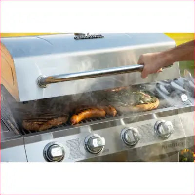 Stainless steel Performance Series Silver propane gas grill cooking delicious food