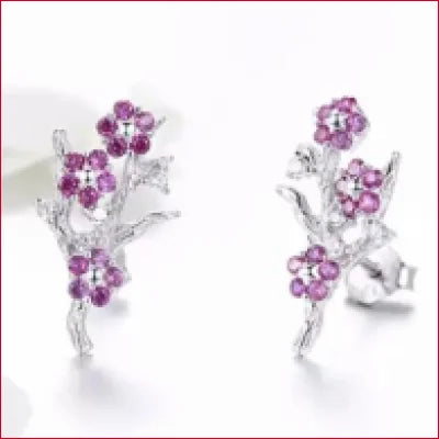 Sterling Silver Flowers Stud Earrings with Plum Zircon featuring purple floral designs