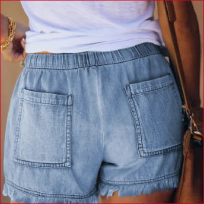 Pair of light blue casual denim shorts with frayed hems and back pockets