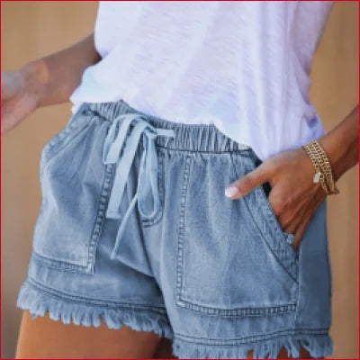 Light blue casual denim shorts with frayed hems and drawstring waist for stylish comfort