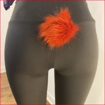 Gray leggings with bright orange furry patch, featuring Red Pompon Accent Black Spandex Leggings