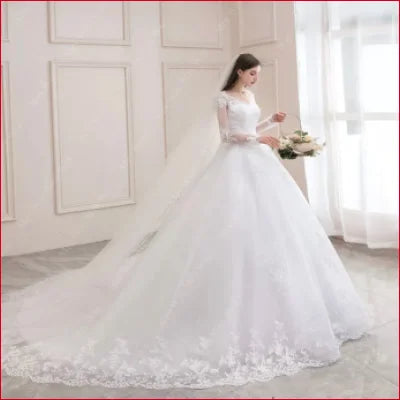 Elegant Princess Wedding Dress with Sleeves featuring a full tulle skirt and lace detailing