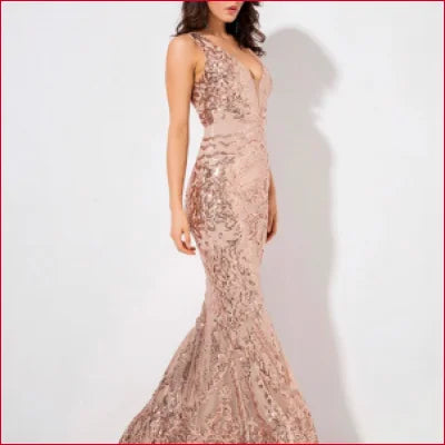 Elegant blush mermaid gown with lace detail, perfect for a chic sequin evening