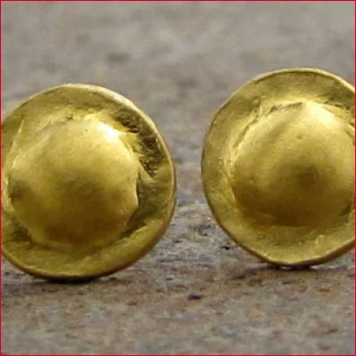 Two golden dome-shaped earrings from Gold Investment and Jewelry Inspired by Ancient Traditions