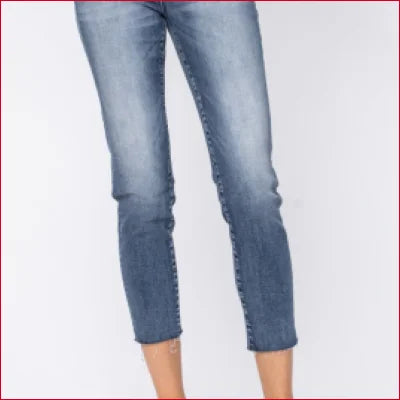 High Waist Raw Hem Jeans in light blue denim with a stylish cropped fit