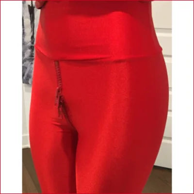 Bright red monochrome leggings with a stylish red crotch zipper in comfortable lycra