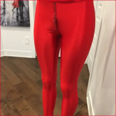 Bright red lycra crotch leggings highlighting a unique style statement on a model