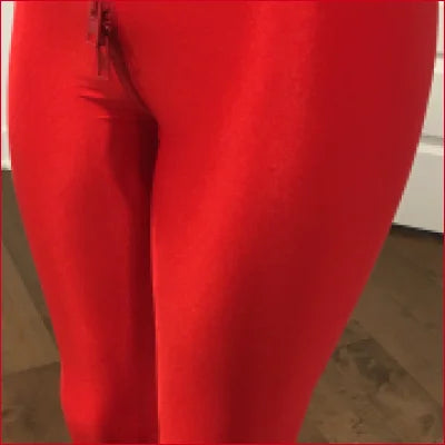 Bright red leggings showcasing Red Lycra Crotch Zipper for a unique style statement