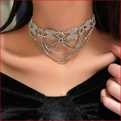 Ornate diamond choker chain bridal jewelry featuring rhinestones and intricate patterns