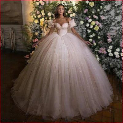 Ornate Off Shoulder Wedding Dress with Tulle Skirt and Glitter Details for Brides