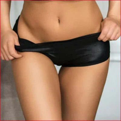 Faux Black Leather Scrunch Panties revealing a toned midriff for a bold look