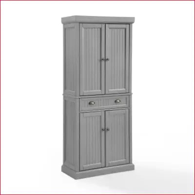 Gray wooden storage cabinet in Seaside Coastal Wood and Metal Pantry with distressed gray finish