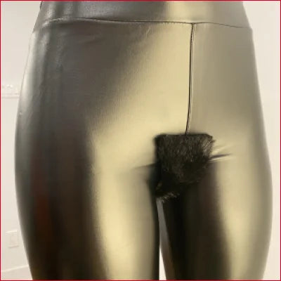 Mannequin lower body in metallic gold leggings, showcasing Vegan Black Leather style for BDSM Fetish