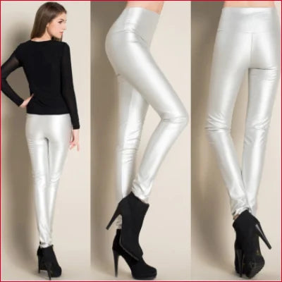 Silver high waist leather leggings styled with black high-heeled ankle boots