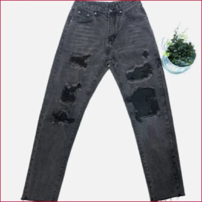 Dark grey destroyed straight leg jeans featuring rips, tears, and a crotch zipper