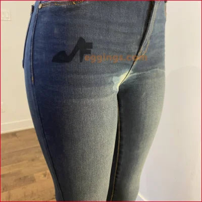 Blue jeans worn on a person showcasing Stained Women’s Pencil Blue Jeans for a unique look