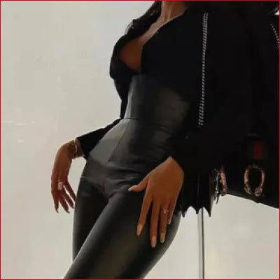 Pole dancer in a black outfit showcasing High Rise Waist Black Faux Leather Leggings