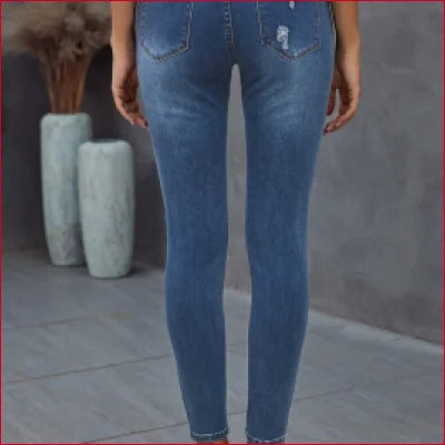 Pair of Dark Blue Stretchy Figure-Sculpting Denim Jeans with distressed details