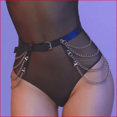 Black high-cut swimsuit bottom with faux leather belt and silver chains for goth style