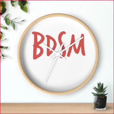 Unique high quality wall clock featuring BDSM in red on a white face for stylish decor