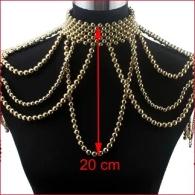 Ornate gold beaded bridal shoulder necklace on mannequin for wedding choker bridal style