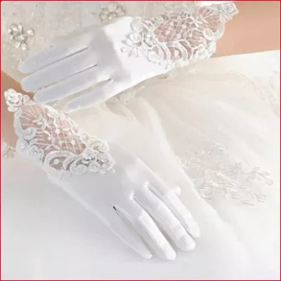 Elegant white lace bridal hand gloves with floral patterns for weddings