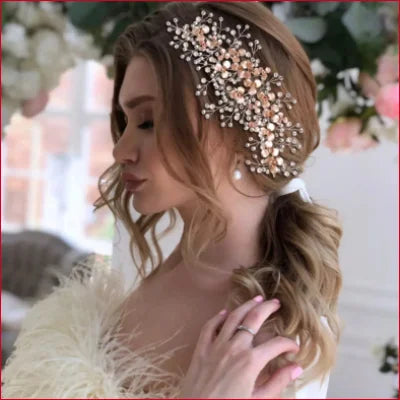 Woman showcasing a Bridal Hairpiece Rhinestone and feathered garment for a stunning look