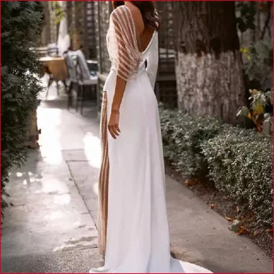 Elegant white wedding dress with unique striped sleeves featured in bridal pantsuit with free shipping