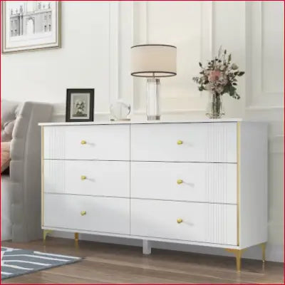 White 6-Drawer Standard Dresser with gold accents for stylish bedroom storage