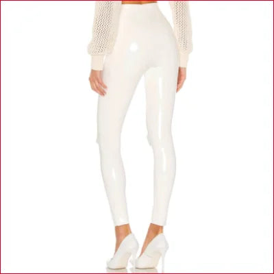 White Disco Pants Faux Leather Leggings showcasing stylish form-fitting design