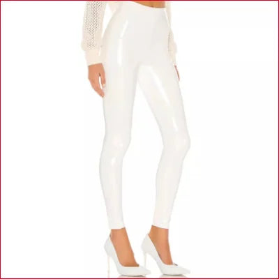 White Disco Pants Faux Leather Leggings styled with white high heels for a chic look