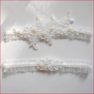 Delicate double white lace garter belt with floral embroidery and pearl accents