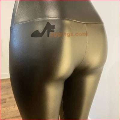 Mannequin lower body in handmade white stained black vegan leather leggings for fetish fashion