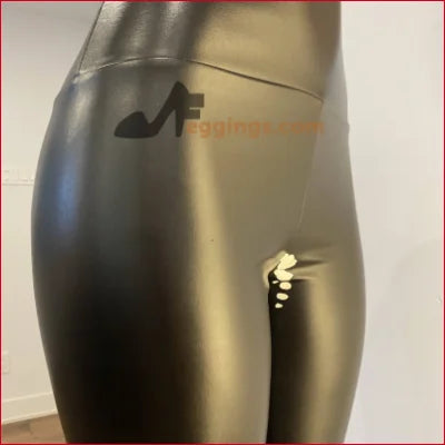 Shiny black vegan leather leggings with logo for fetish fashion, handmade white stained design