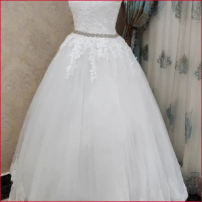 Off Shoulder Princess Wedding Dress in White with Fitted Bodice and Full Tulle Skirt