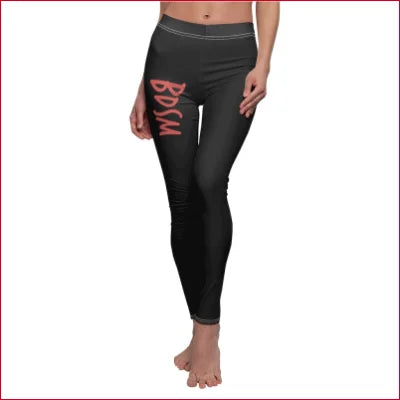 Black elastic skinny fit leggings with BXXI print in red on left thigh