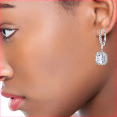 Sterling Silver Zircon Drop Hoop Earrings featuring a cushion-cut diamond center stone