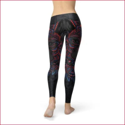 Patterned black women’s leggings with colorful floral designs in USA fabric blend