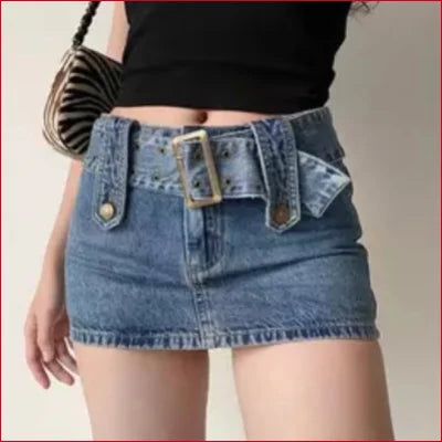 Denim mini skirt with wide belt waistband, featuring decorative flaps, perfect for Boho Belted Y2K style